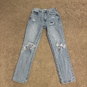 High-waisted blue distressed mom jeans